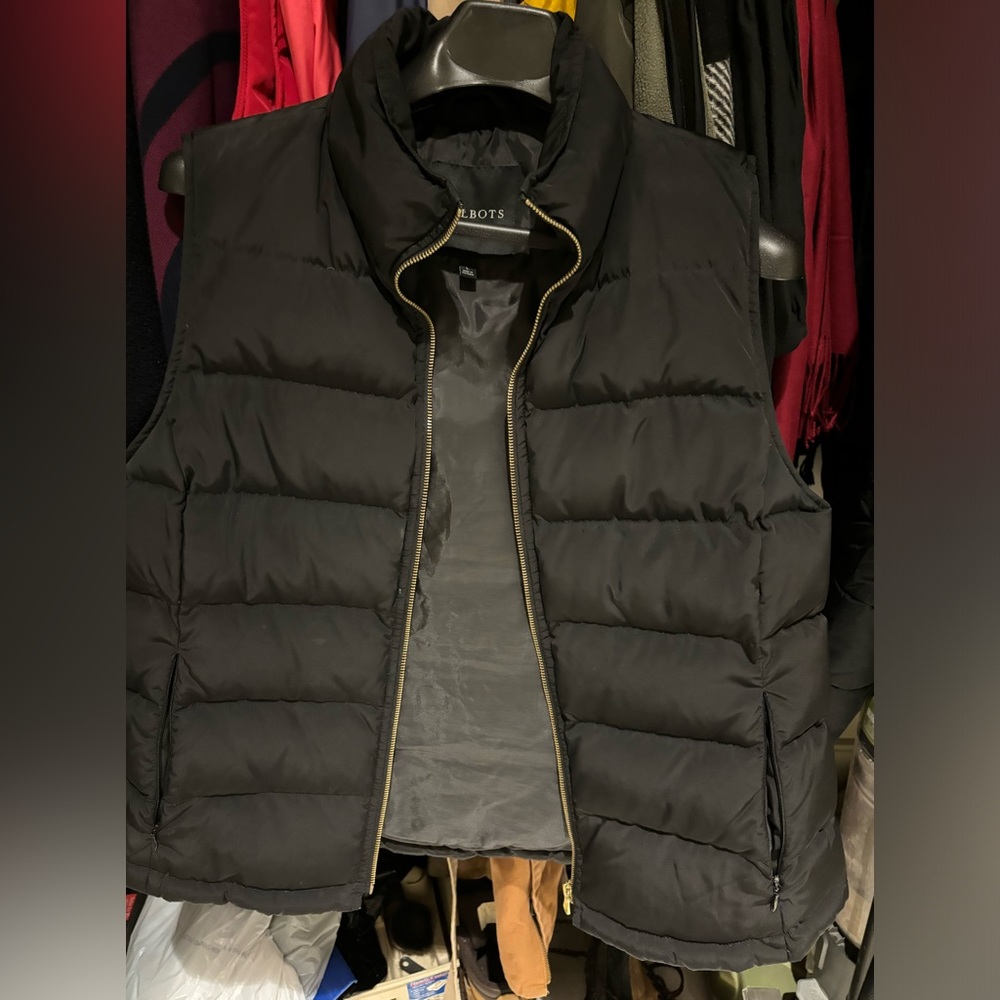 Awesome waterproof vest. Worn only a handful of times. Brand new condition.